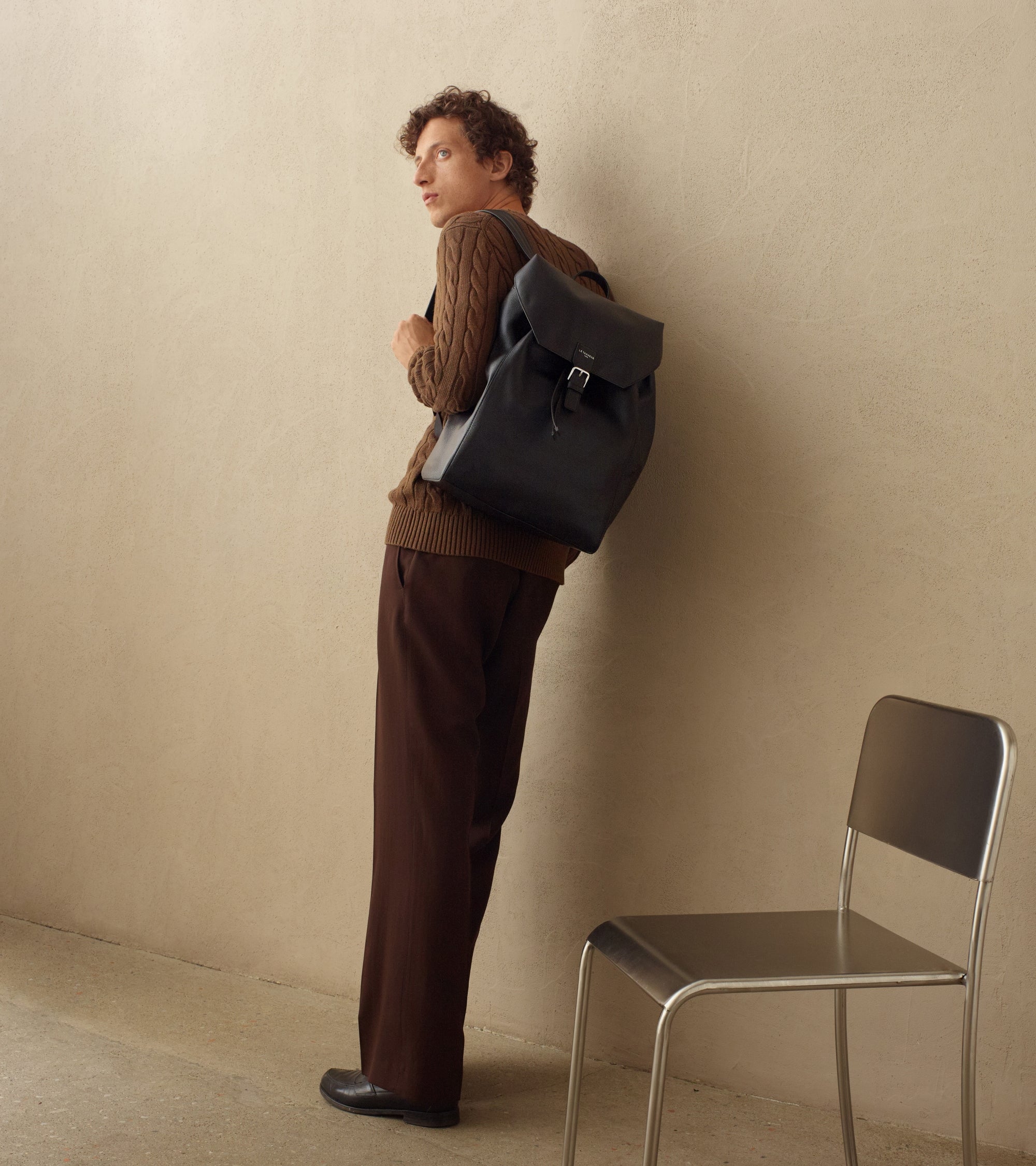 Emile backpack in grained leather with a flap