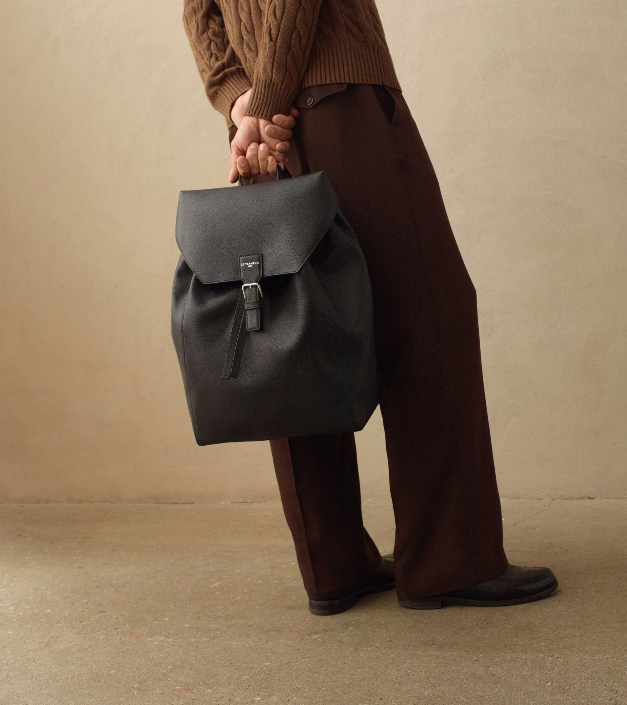 Emile backpack in grained leather with a flap